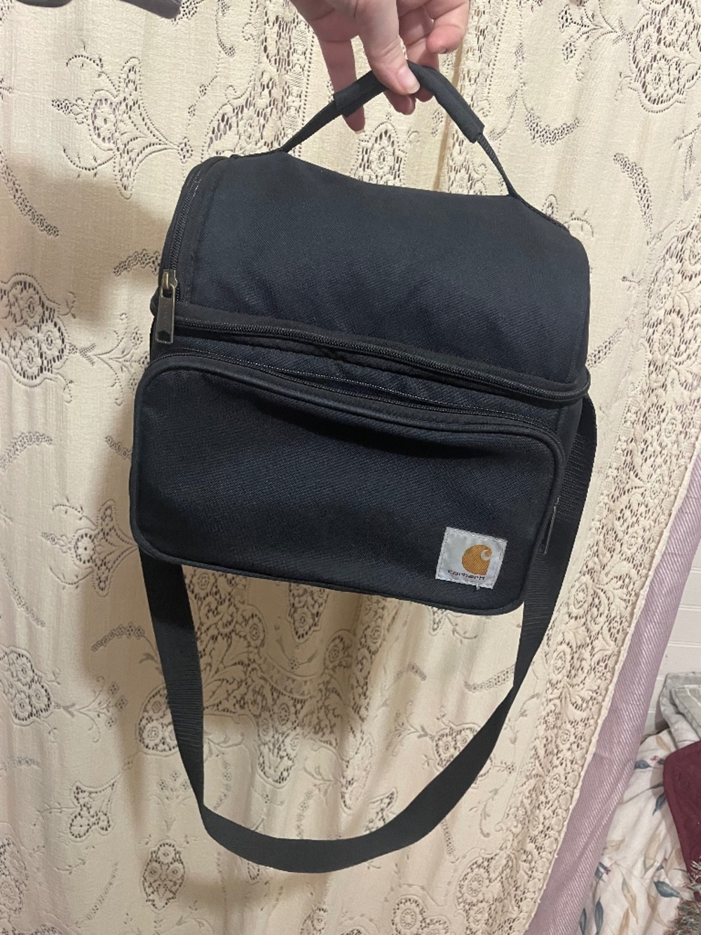 Carhartt: Deluxe Dual Compartment Insulated Lunch Cooler Bag in black.